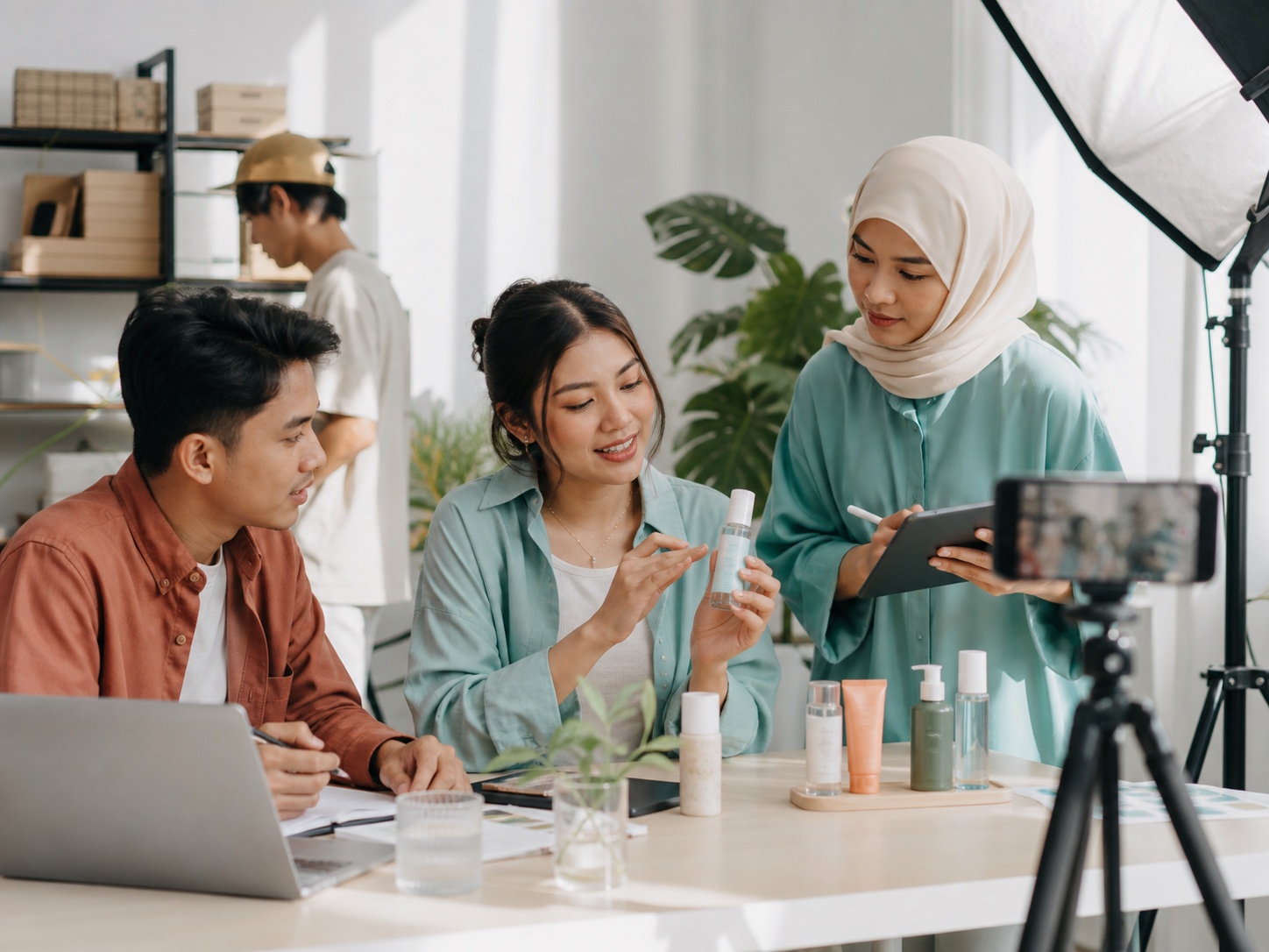 A regional creator-commerce team working in a daylight production studio